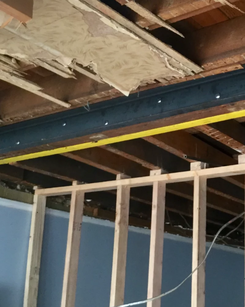 Structural repair project beam in basement